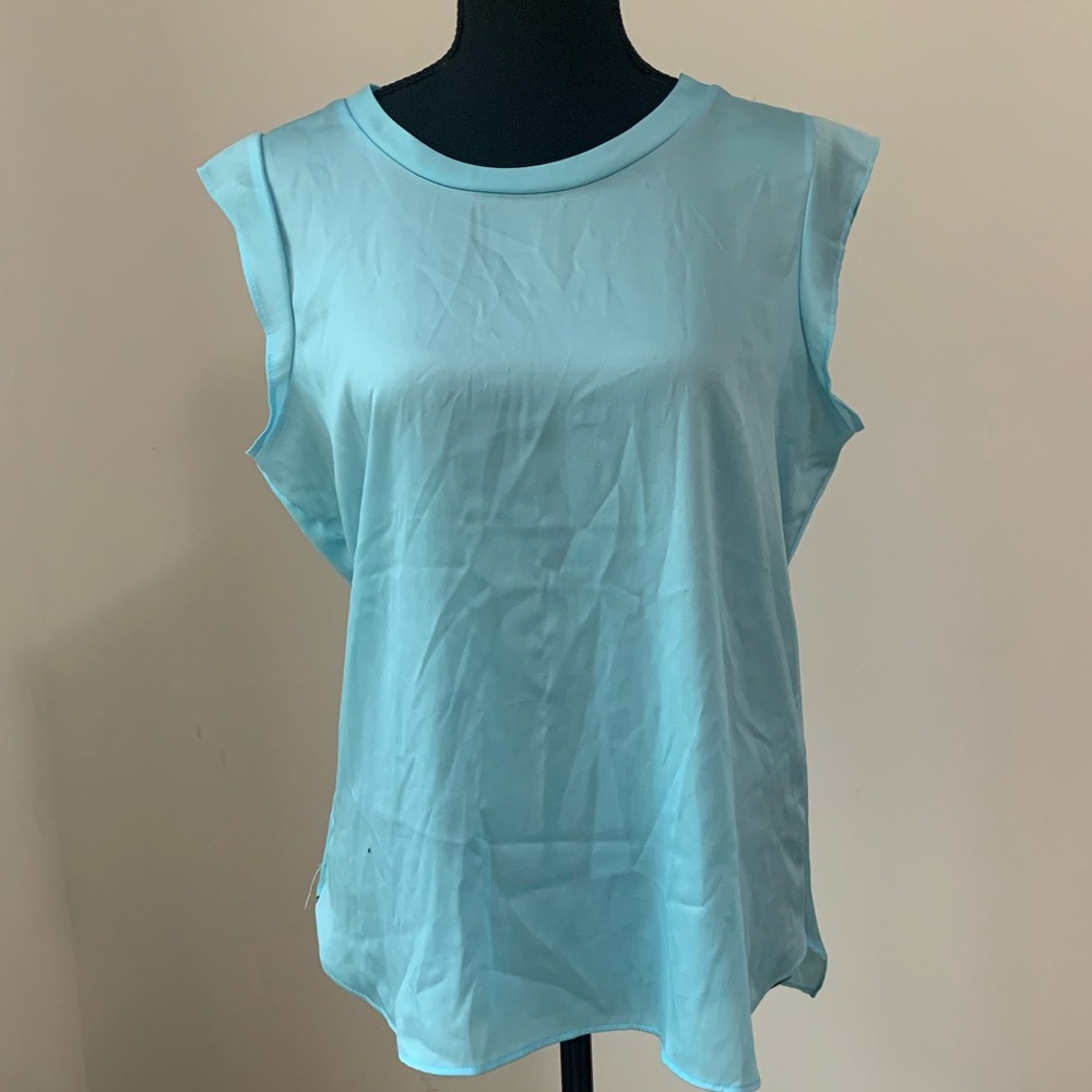 DKNY light blue top with cap sleeves. Size Small